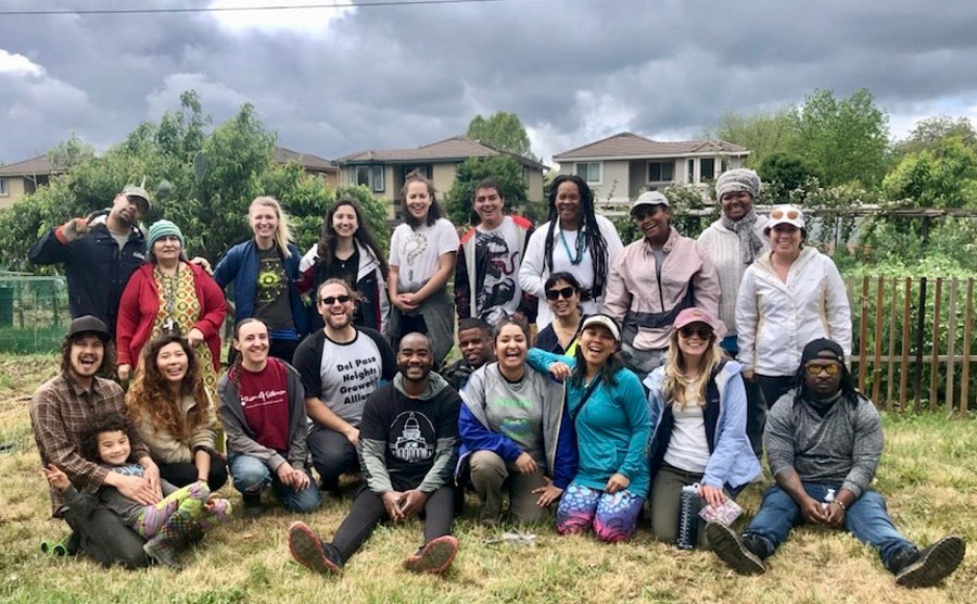 Large group photo of PACE participants at the Del Paso Heights Growers' Alliance.