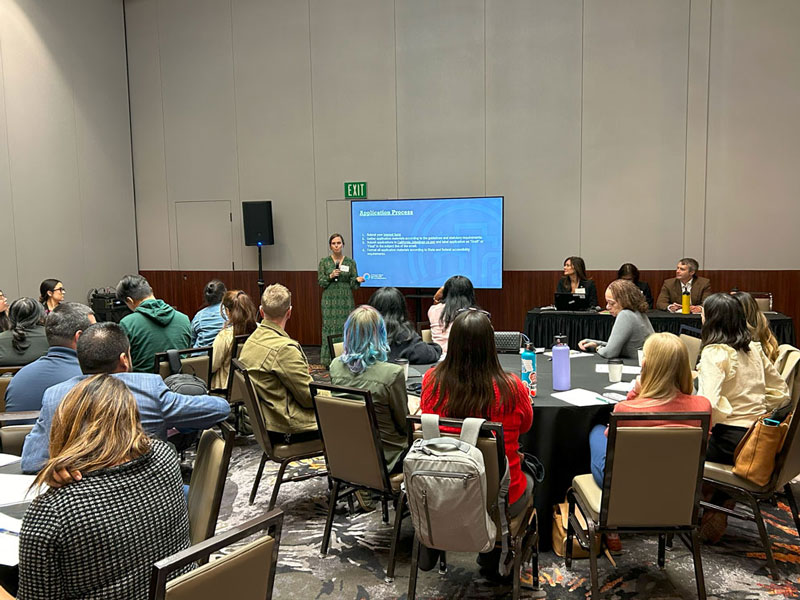 Attendees listening to a presentation during a breakout session.